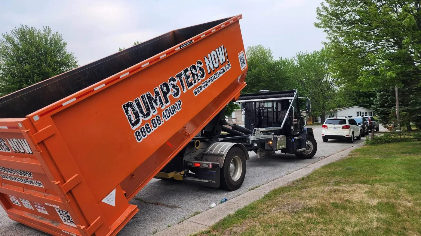 Heavy duty construction roll off dumpster on job site