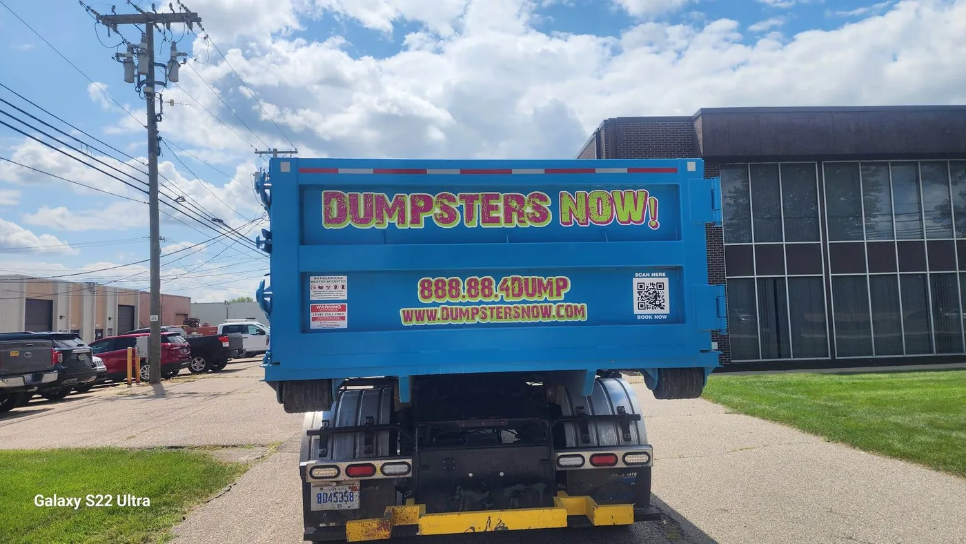 How Much Shingle Debris Fits in a Dumpster? Michigan Roofing Waste Guide