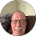 Smiling elderly man relaxing at home.